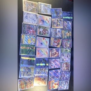 Lot of Pokémon Cards in Covers! Several Rare Pokémon included.  Great Condition